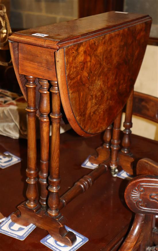 A late Victorian burr walnut Sutherland table, W.52cm, D.15cm, H.53cm